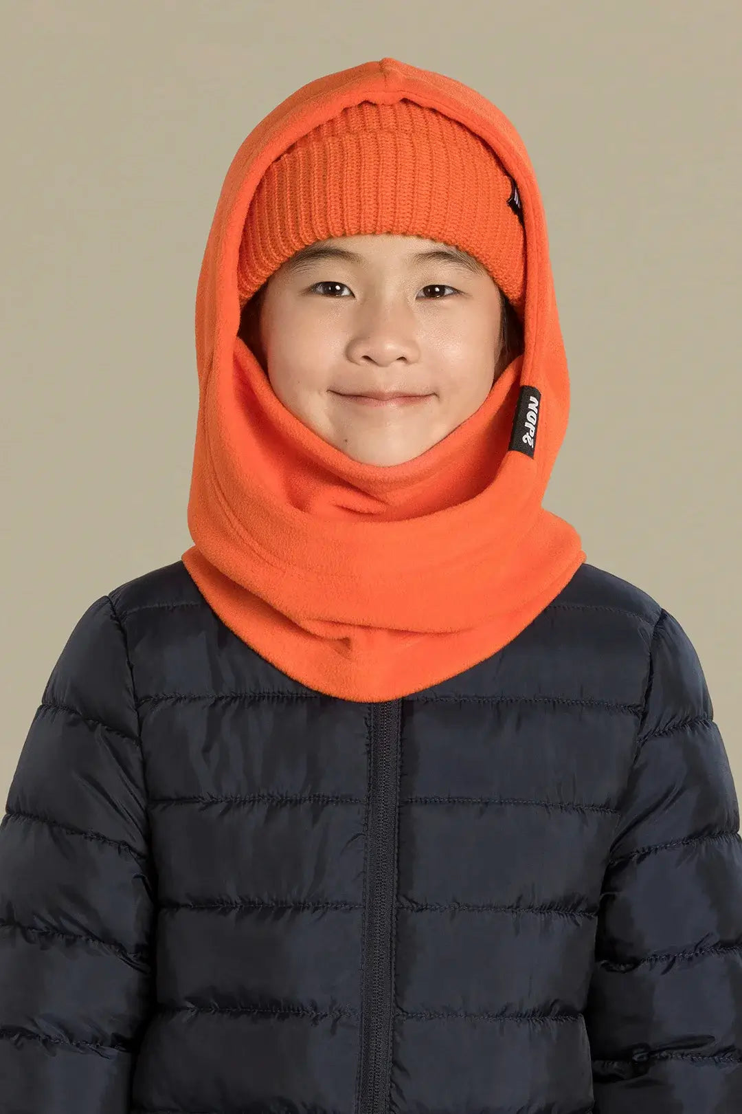 capuche pour enfant nopé et un beanie de couleur tangerine