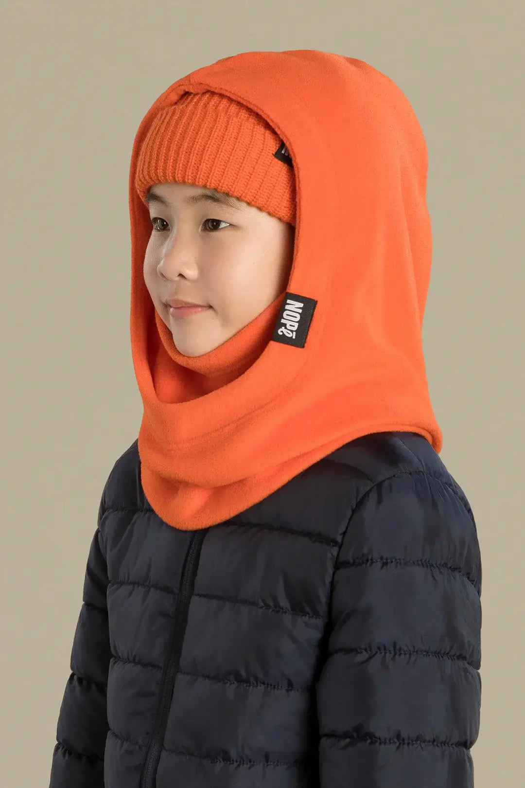 capuche pour enfant nopé et un beanie de couleur tangerine