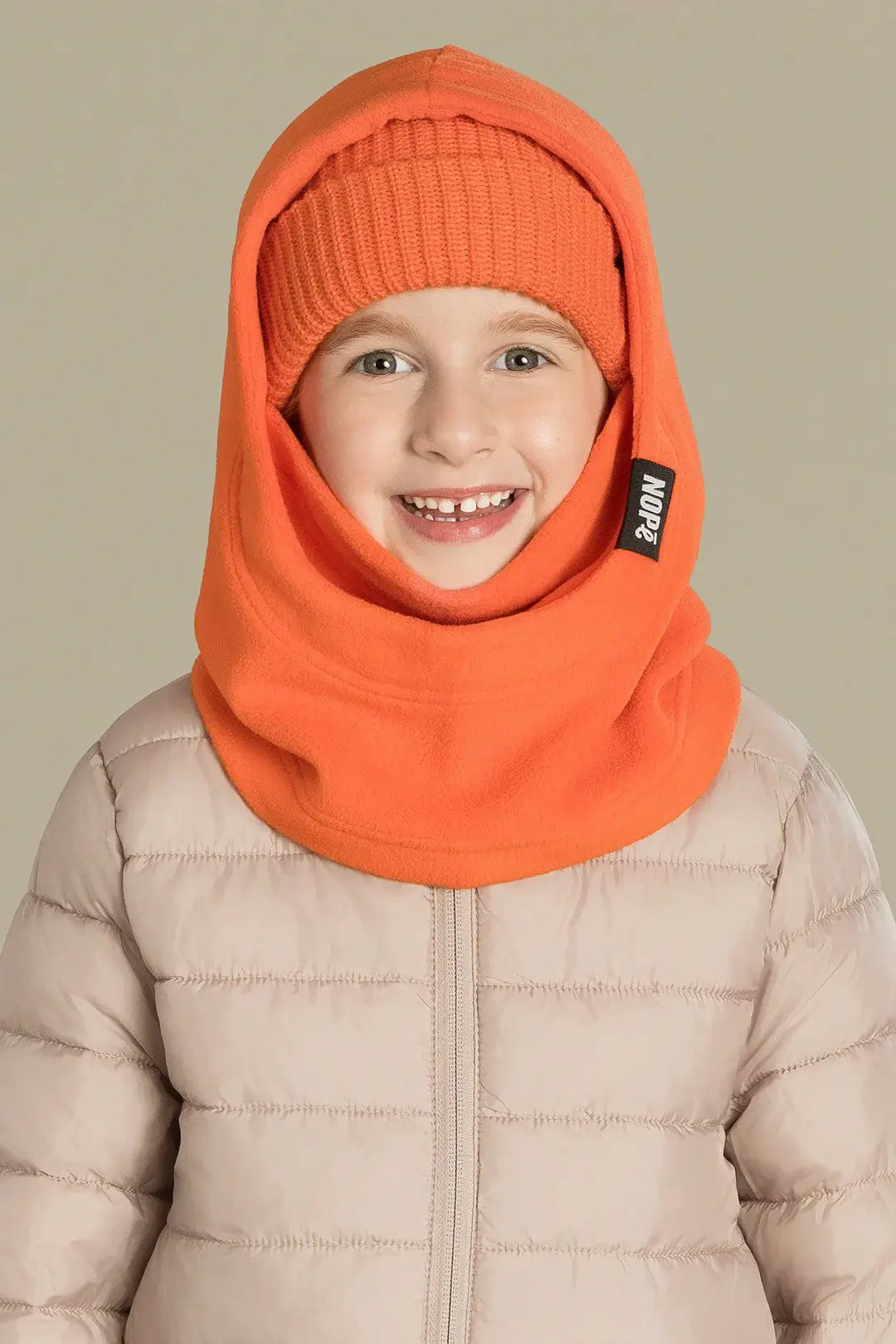 capuche pour enfant nopé et un beanie de couleur tangerine