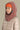 capuche pour enfant nopé de couleur vieux rose avec un beanie de couleur tangerine