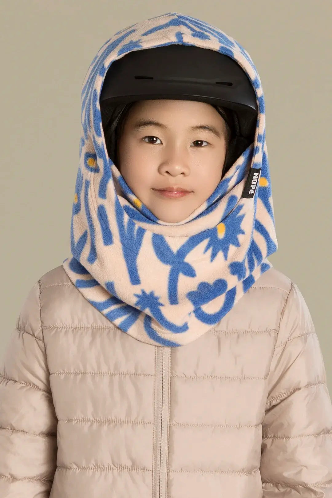 surcapuche pour enfant nopé de couleur florale bleue