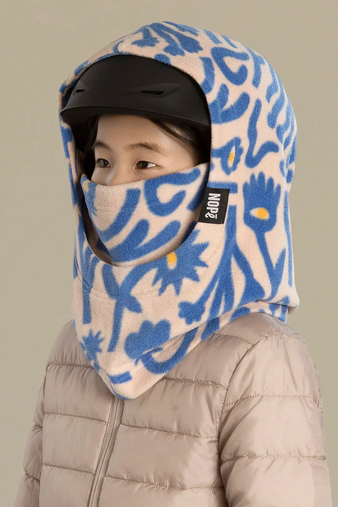 surcapuche pour enfant nopé de couleur florale bleue