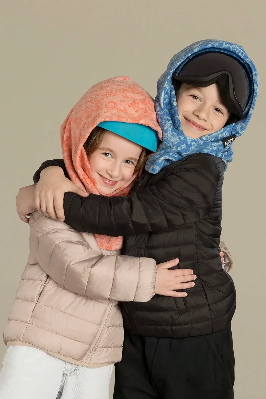 surcapuche pour enfant nopé de couleur tattoo rose et bleu